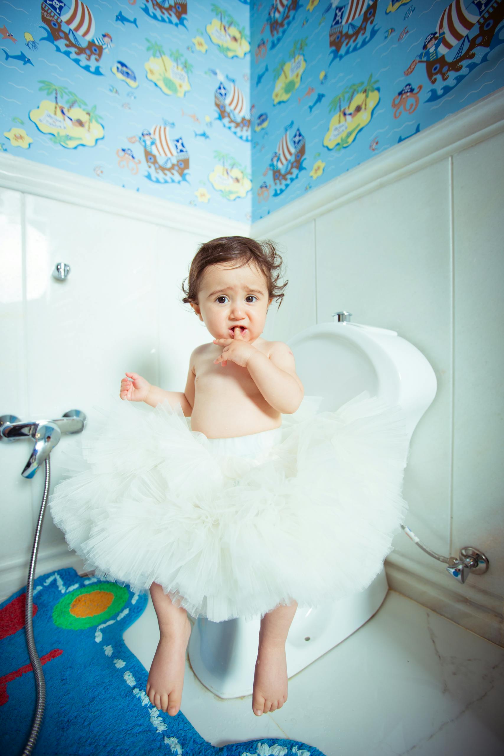 Cute Baby on the Toilet