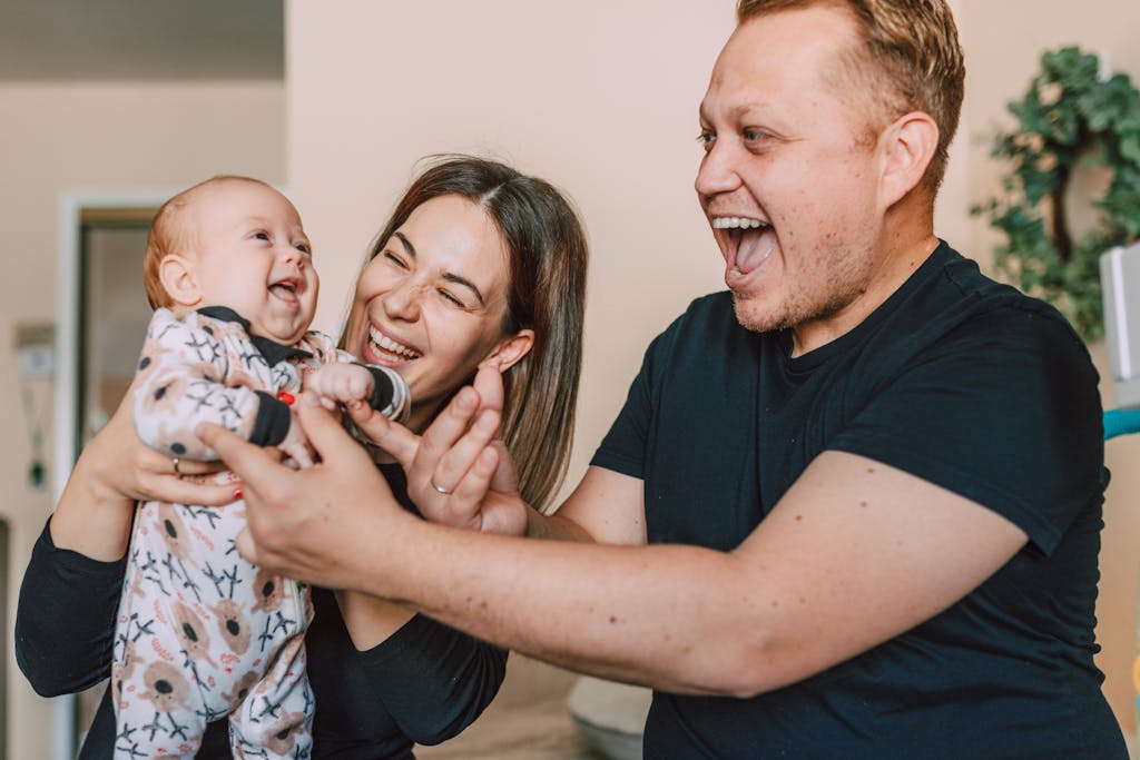 Parents Playing with their Baby